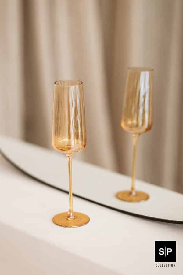 Ray collectie champagneglas set van 4 stuks, amber kleurig glaswerk